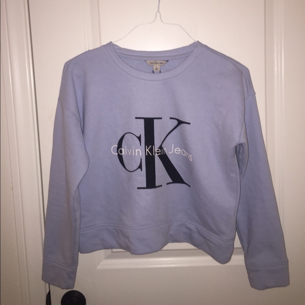 Calvin Klein cropped logo sweater.