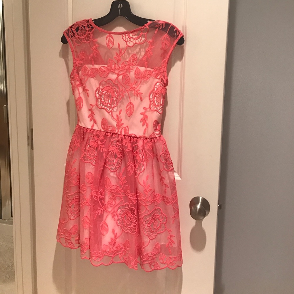 Fun lace cocktail length dress.