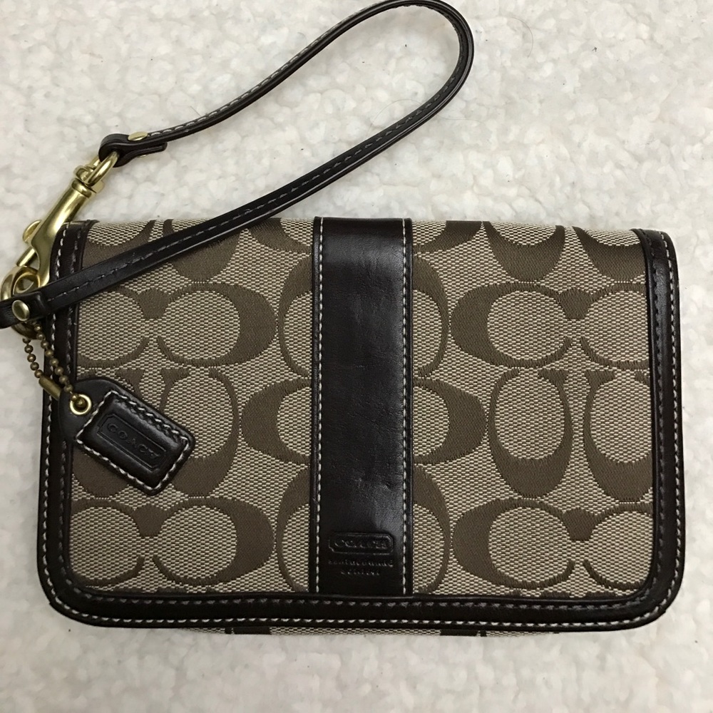Like new Coach brown signature fabric wristlet
