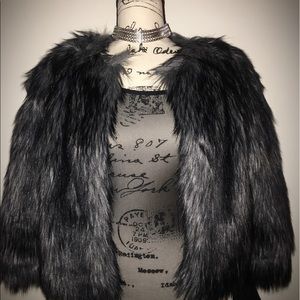 Faux fur coat and an ALL sheer bodysuit