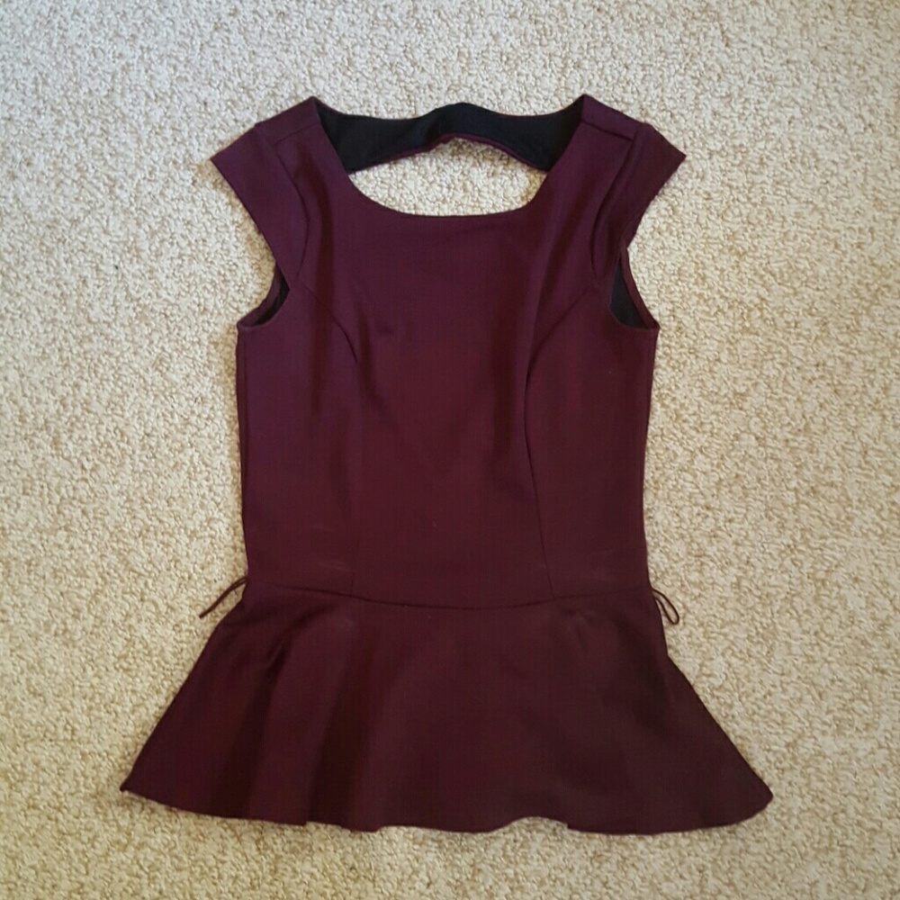 Peplum shirt with open back
