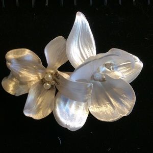 Shiny white orchid and dogwood hair accessory