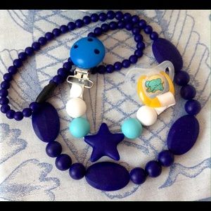 Teething necklace and pacifier clip