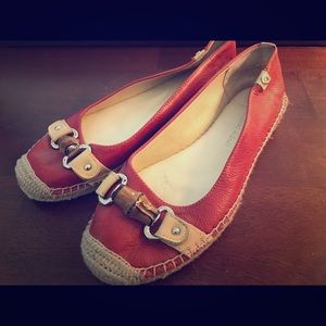 Etienne Aigner red & off-white wood embellishment.