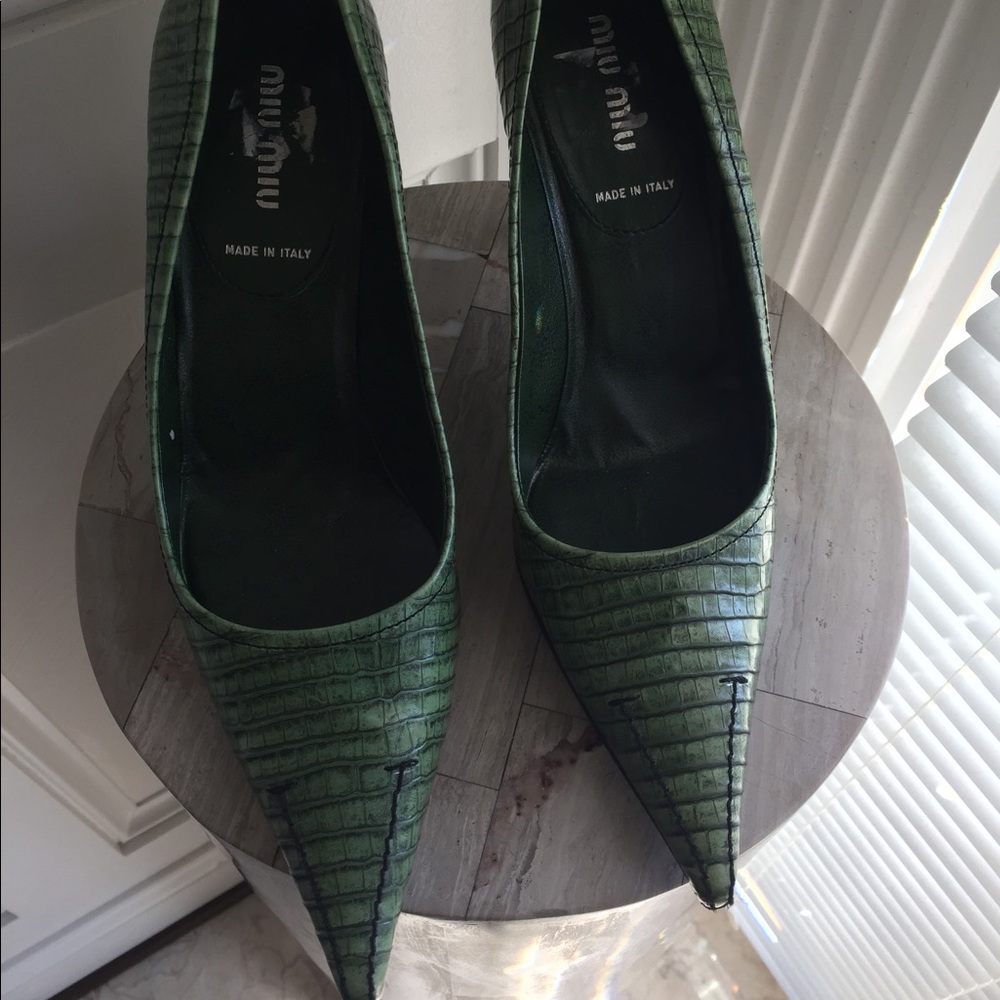 Miu Miu green pointy pumps.