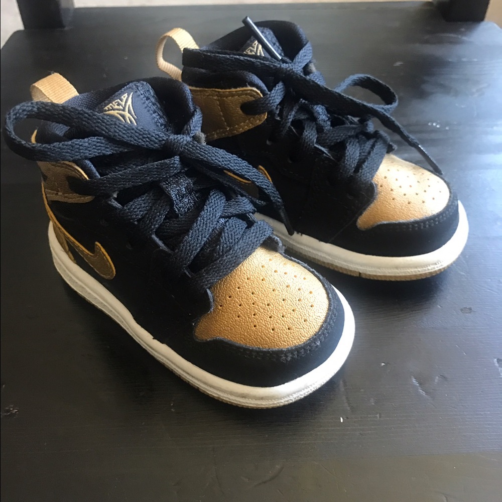 Gold and Black Jordan's Rare