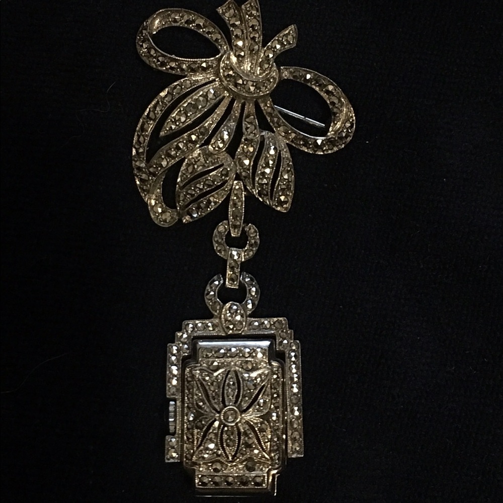 Vintage Bucherer silver & marcasite lapel watch.