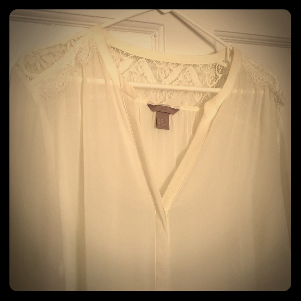 Never worn off white blouse with lace shoulders.