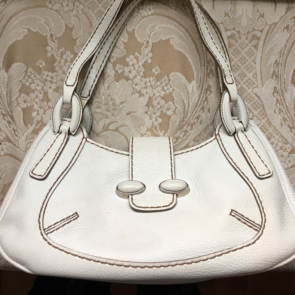 Tod's pebbled white handbag.   *3