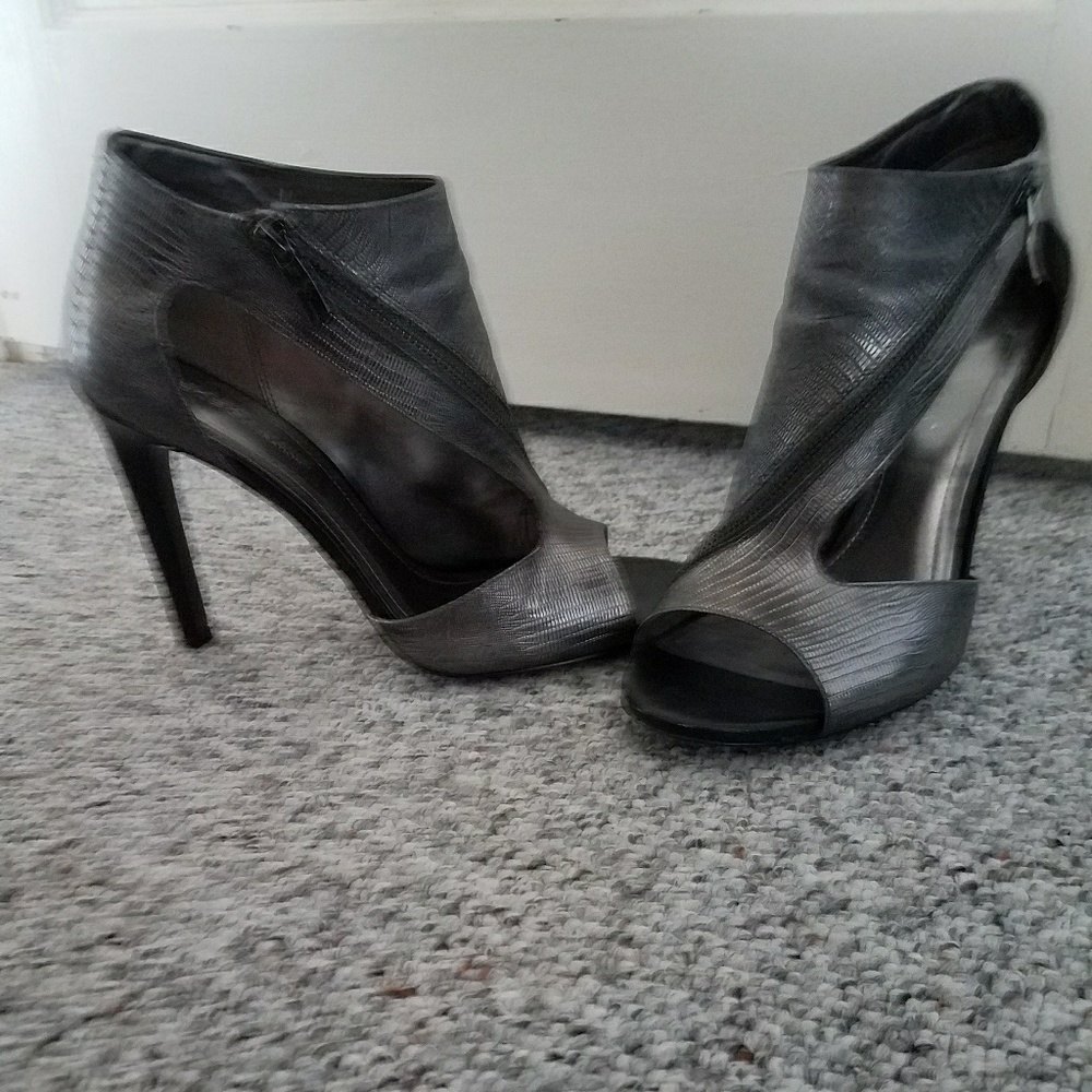 Trendy silver zipper BCBG booties.