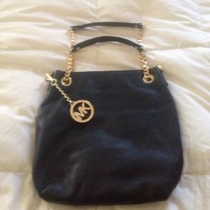 Black and gold Michael Kors bag