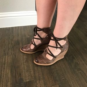 Lace up leather wedge ankle booties