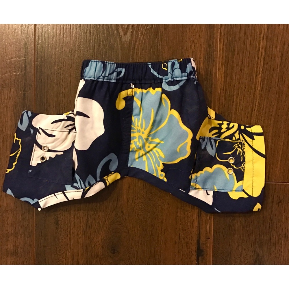 Adorable small breed dog Hawaiian swim trunks 🌴🌺