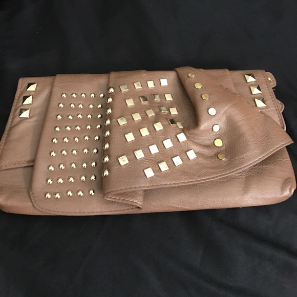Jessica Simpson Handbags - Jessica Simpson brown clutch with gold studs.