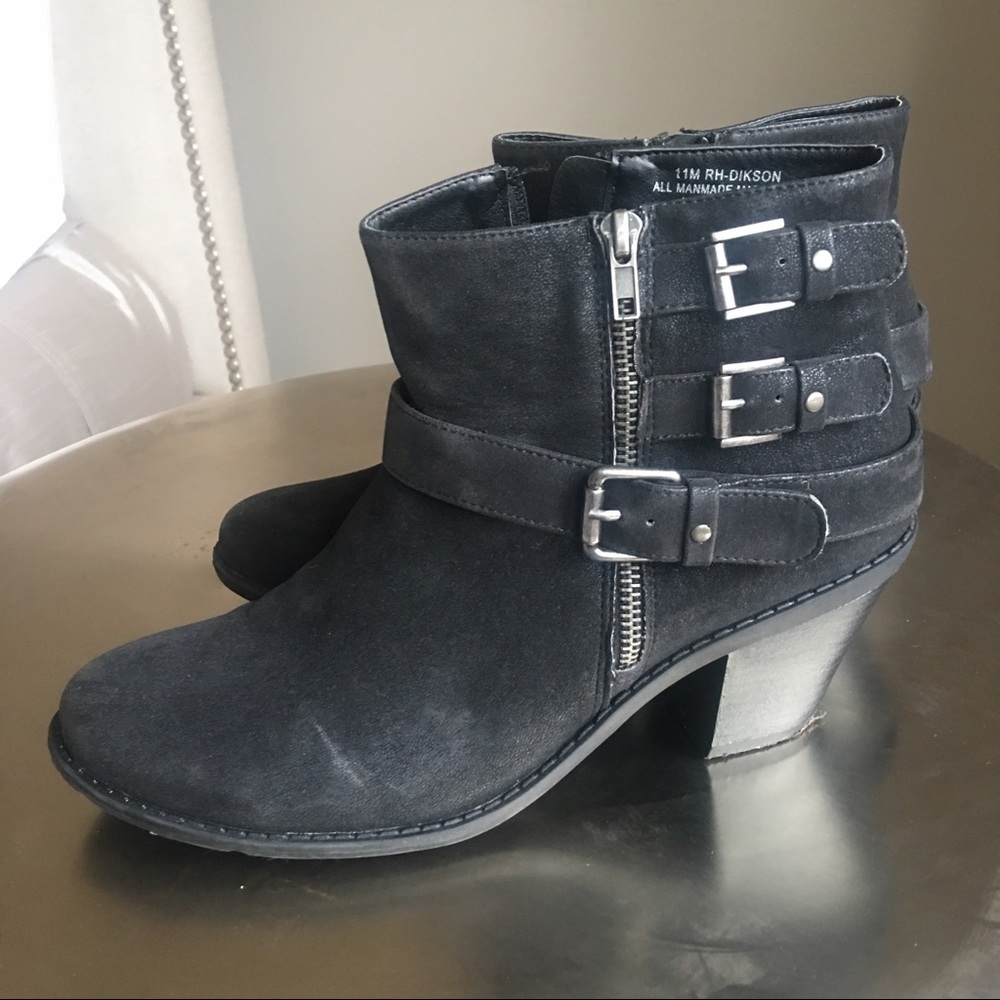 Black booties with buckles.