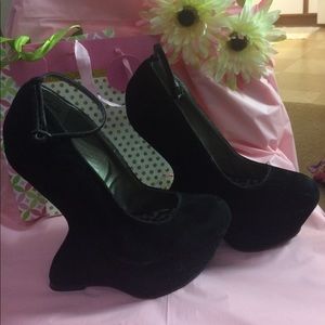 Black "velvet" carved heel-less wedges