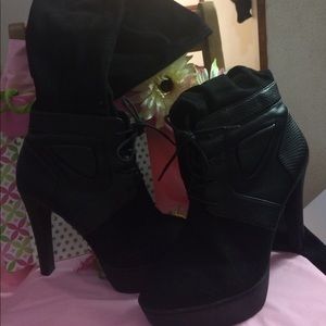 High heeled thigh hi boots (above the knee)