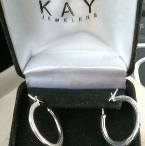 Sterling silver diamond earring.