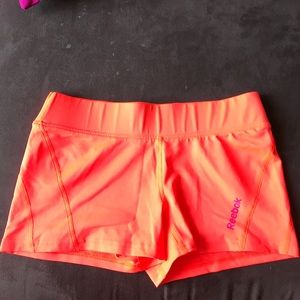 Reebok bright Orange Play Dry Spandex Shorts