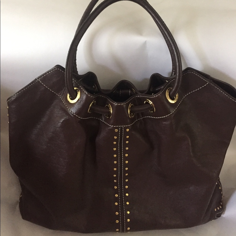 Michael Kors brown with studs saddle bag