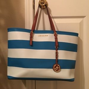 Blue and white striped Michael Kors bag