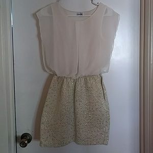 Dress with embroidered skirt and flowy top