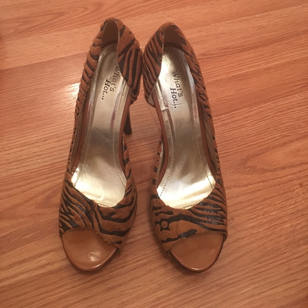 Brown and black peep toe pumps