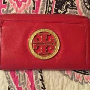 Tory Burch Wallet. . Good condition with no tears.