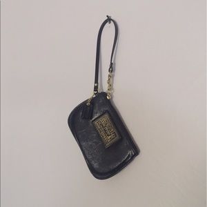 COACH patent leather wristlet