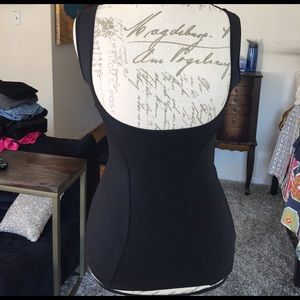 Black open chest tummy tuck