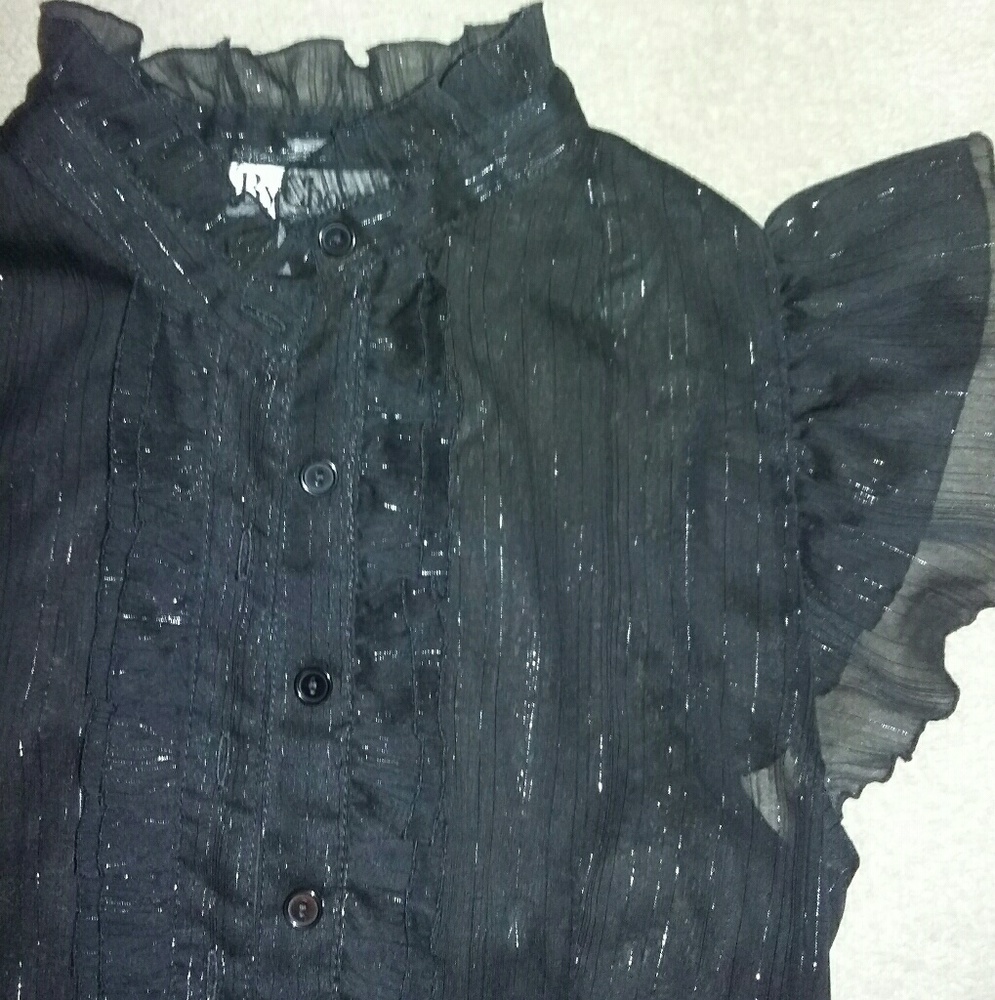 Sheer black button up shirt.
