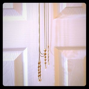 Wrap around lariat style gold necklace