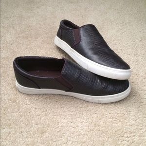 Faux snakeskin slip-ons