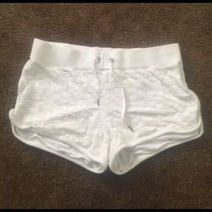 BEBE white floral lace Shorts