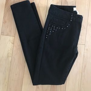 F21 black skinny jeans with studs on pockets