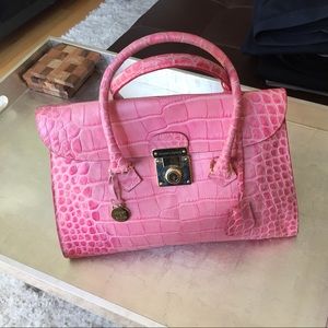 Bright pink Dooney and Bourke satchel