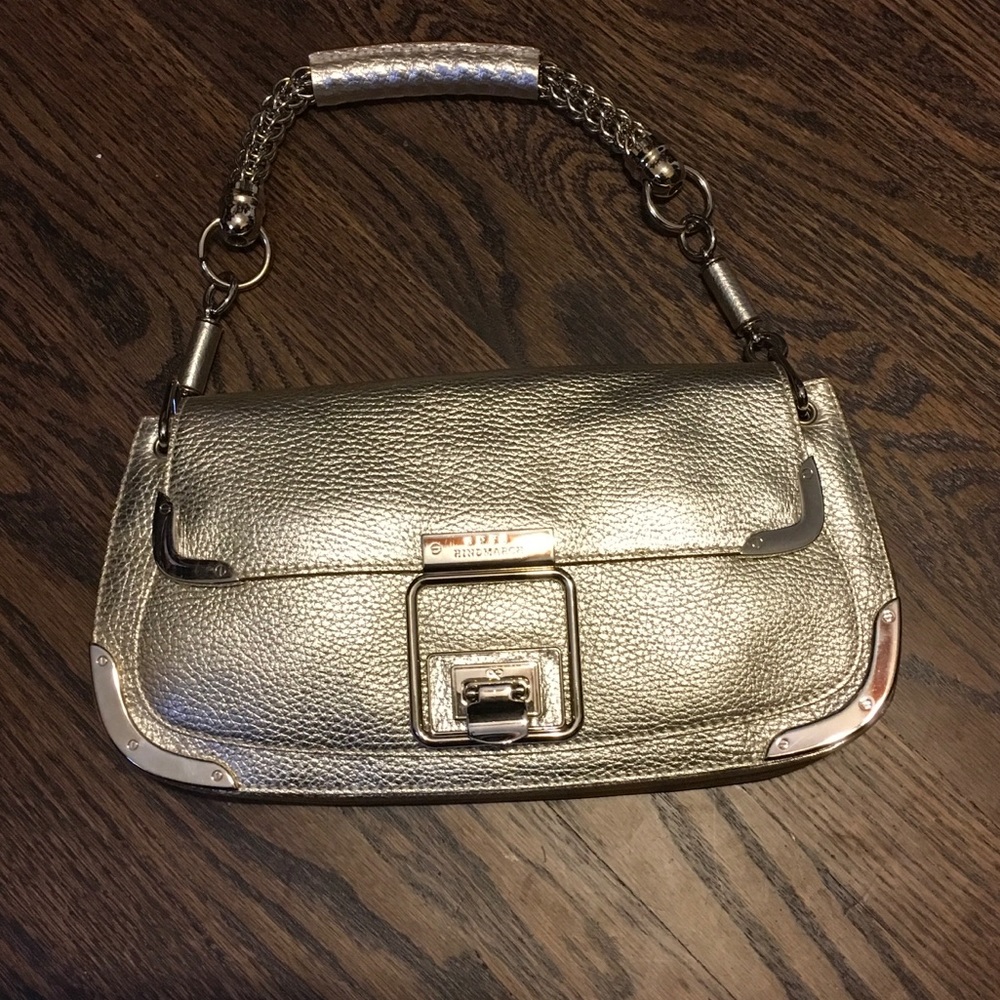 Anya Hindmarch gold purse.