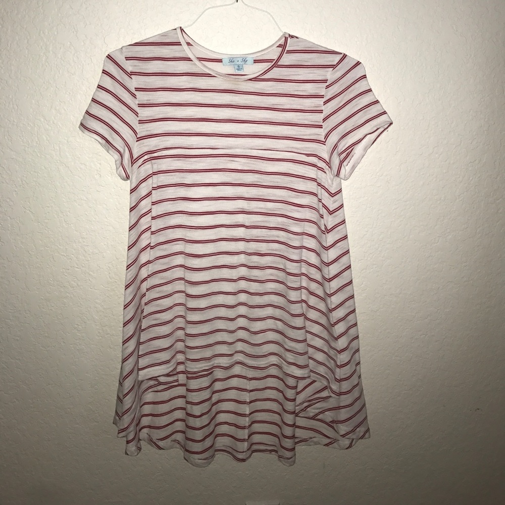 Red and white high low shirt