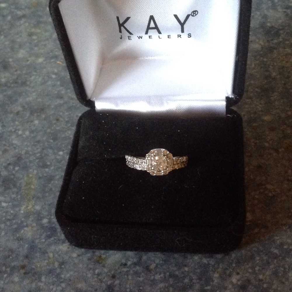 7/8 Cttw engagement ring and wedding band set.