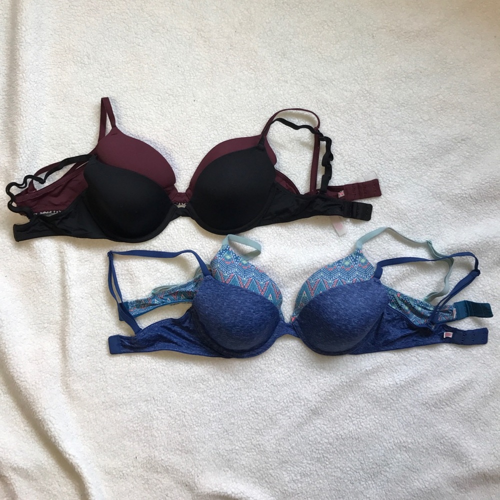four VS/PINK bras