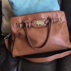 Luggage brown color. Leather