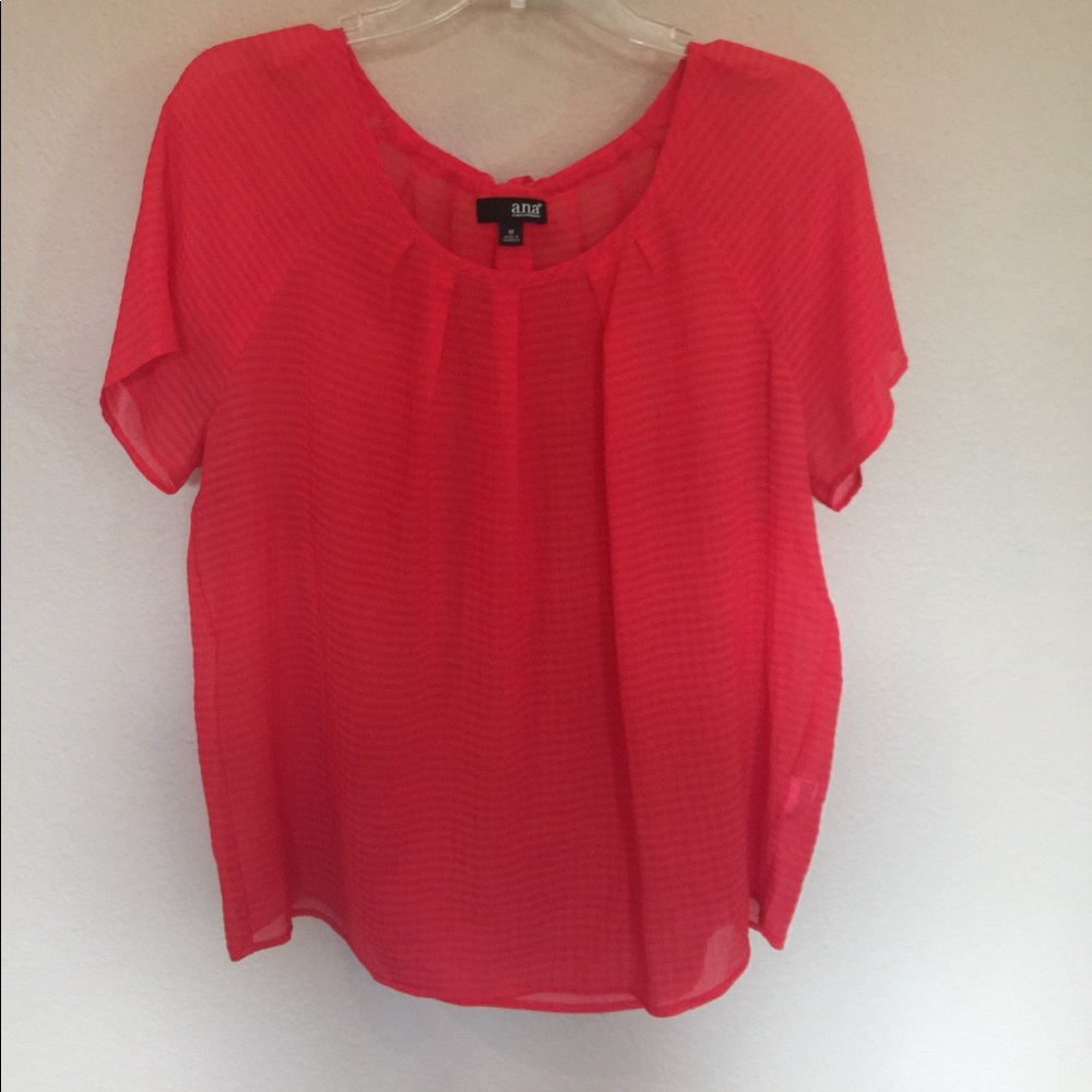 Reddish orange blouse