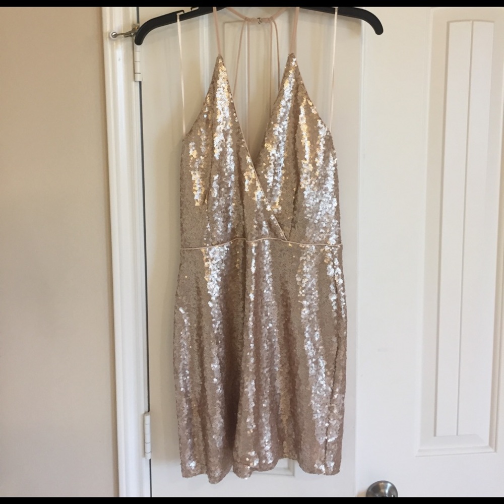 Plunging sparkle party dress with strappy back