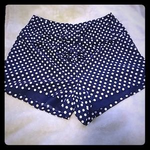 Polka dot shorts.