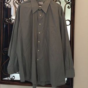 Sage green button down shirt.
