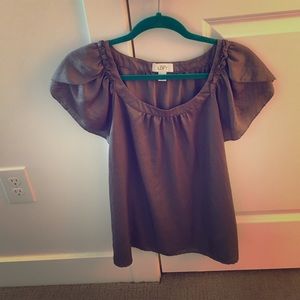 Olive colored blouse.