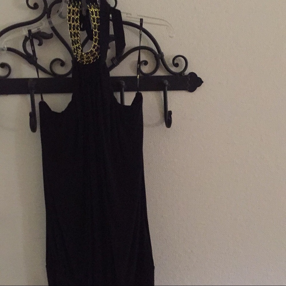 Black Skye tunic. Gold chain details at neck.