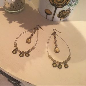 Gold and green dangly earrings