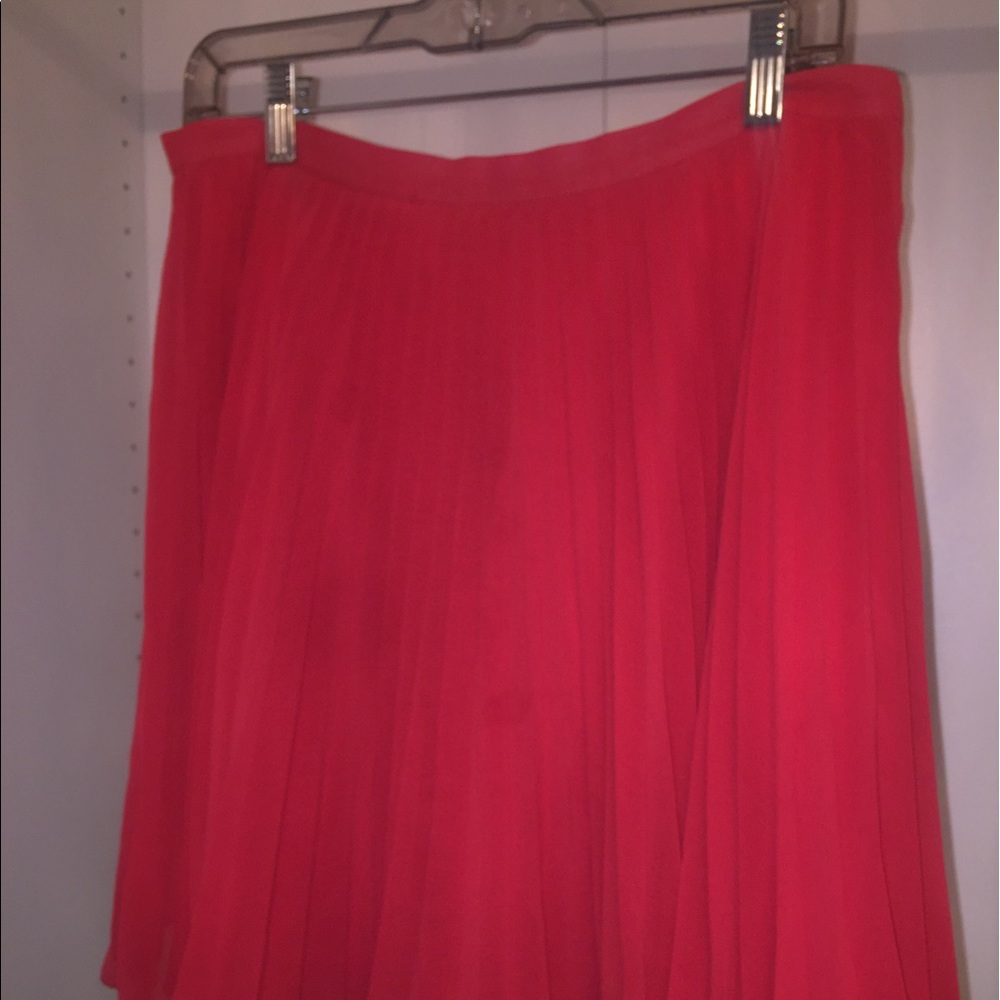 Red pleated skirt