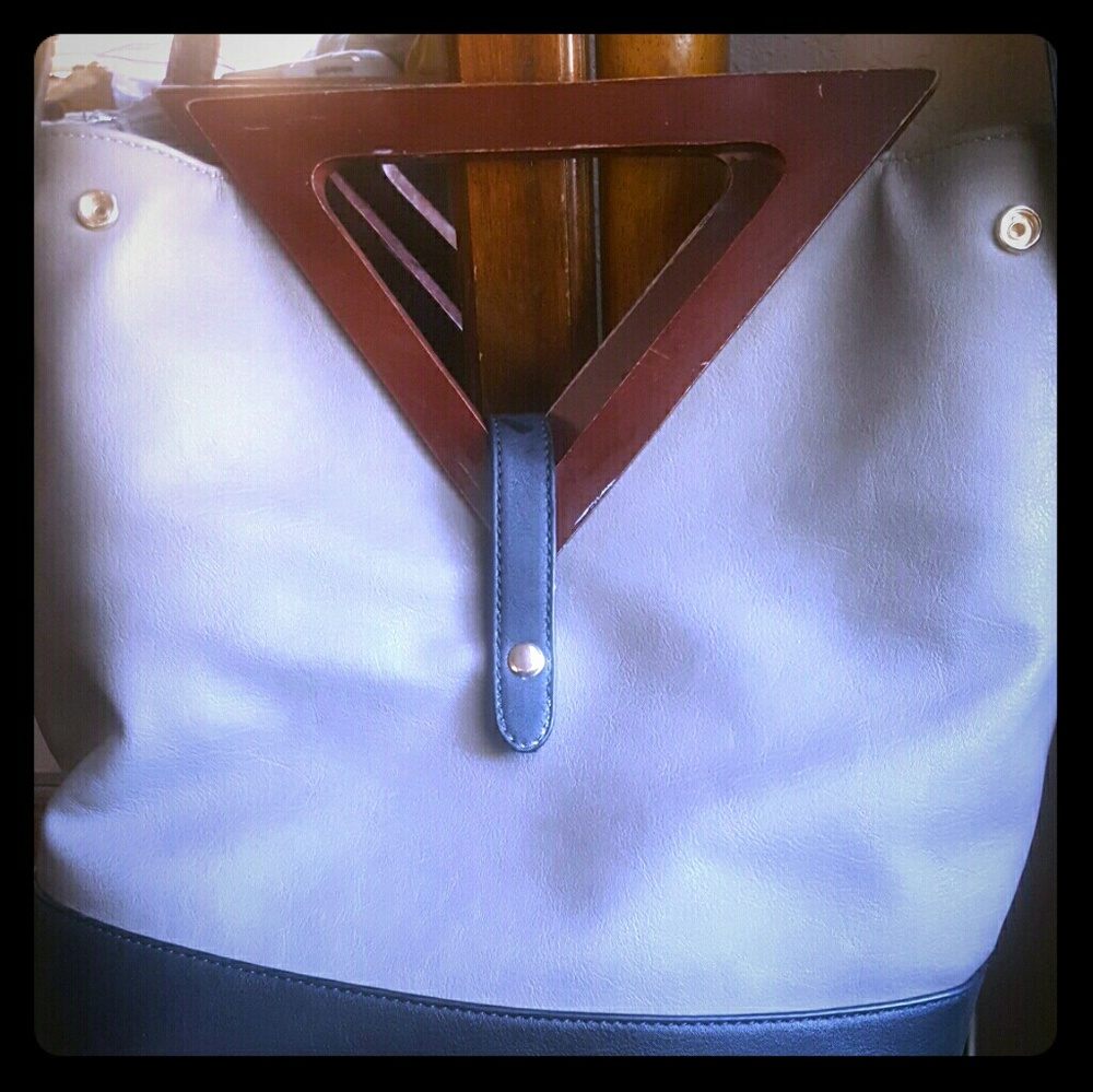 Geometrical wooden trangle shaped purse.